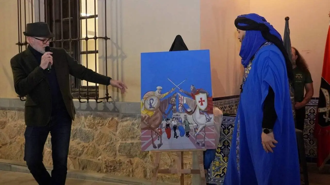 El alcalde de Santomera, V&iacute;ctor Mart&iacute;nez, particip&oacute; en la presentaci&oacute;n del cartel junto a su autor, el reconocido dibujante Jos&eacute; Manuel Puebla Ros