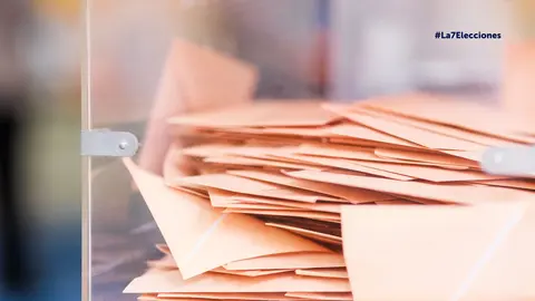 Votos en una urna