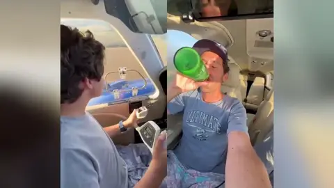 Im&aacute;genes del video viral en el que se ve a una padre y a un hijo antes de morir en un accidente del avi&oacute;n  (foto: Twitter)