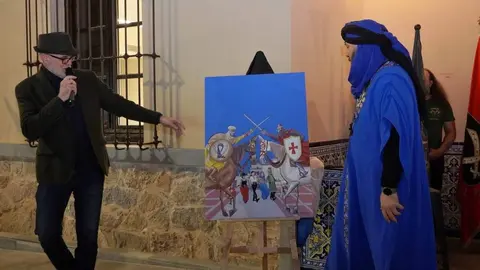 El alcalde de Santomera, V&iacute;ctor Mart&iacute;nez, particip&oacute; en la presentaci&oacute;n del cartel junto a su autor, el reconocido dibujante Jos&eacute; Manuel Puebla Ros